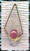 Natural double terminated Quartz with a ruby cabe
