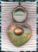 clear Quartz ball with an agate heart and Sunstone cabe