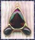 Smoky Quartz facet with two Black star cabes