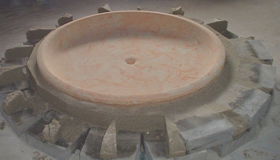 sides of sand pit removed for access to the dish.